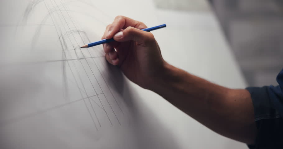 Hands, architect and drawing with closeup, board and lines for creativity, editing or process at company. Person, engineer and paper with pencil, writing or sketch with project management at agency