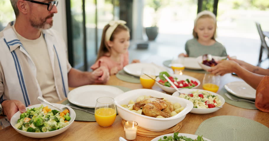 Family, hands and dishing with salad for healthy food, eating diet or chicken lunch at home. Mom, dad and children with plate, serving vegetables or meal for thanks giving dinner, feast or nutrition