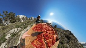 Man and Woman Taking Slices of Pepperoni Pizza from an Open Box While Sitting by the Ocean on a Rocky Cliff, Enjoying a Scenic View Under a Bright Blue Sky with the Sun Reflecting on the Water - Powered by Shutterstock - Get 15% off with code: PIKWIZARD15