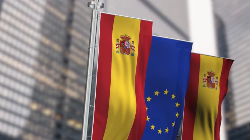 National flag of Spain waving with the European Union vertical flag on a clear day. International cooperation. Seamless 3d render animation. Slow motion loop. Selective focus. Cinema 4k
