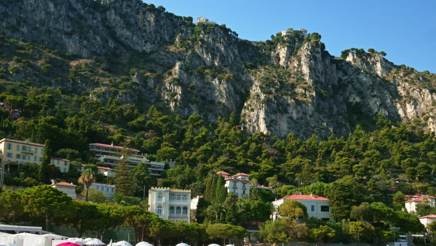 Rugged cliffs and hills of the Maritime Alps, that rise behind Beaulieu-sur-Mer