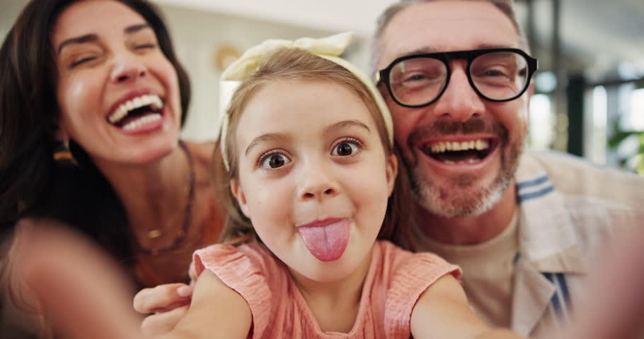 Happy family, silly face and love with selfie for picture, funny memory or photography together at home. Portrait, mom and dad laughing with tongue out in POV for goofy moment, capture or bonding