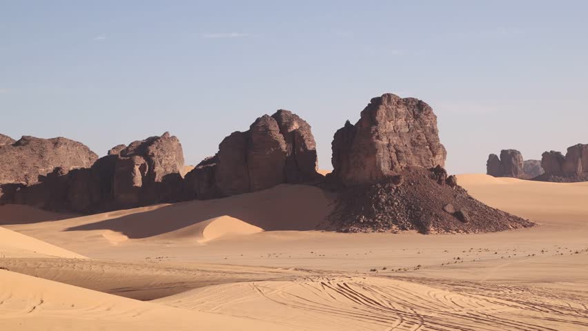 Panoramic view desert landscape panoramic sand dunes and rock formation in Tadrart Rouge, Tassili N