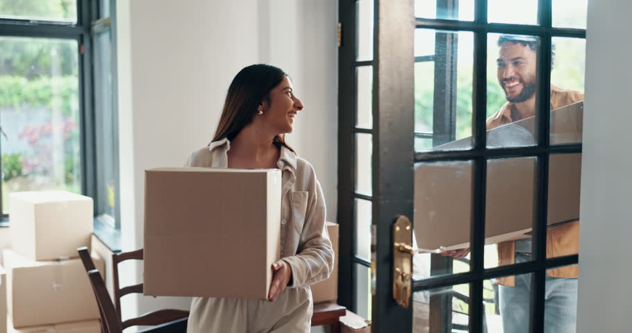 New home, happy and couple with boxes for moving, property and investment in house. Homeowner, real estate and excited man and woman with packages for mortgage, purchase and rental apartment together