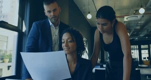 Analyzing global data with digital map overlay, business professionals in office. Technology, collaboration, teamwork, analysis, innovation, strategy - Powered by Shutterstock - Get 15% off with code: PIKWIZARD15
