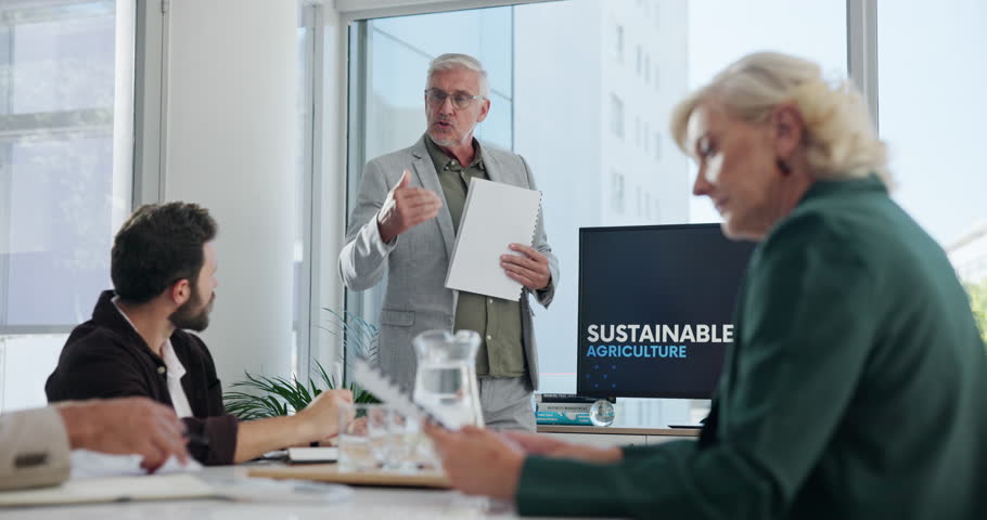 Man, workshop and sustainability with business people in meeting for agriculture, social responsibility and report Planning, speaker and farming impact with employees in office for presentation