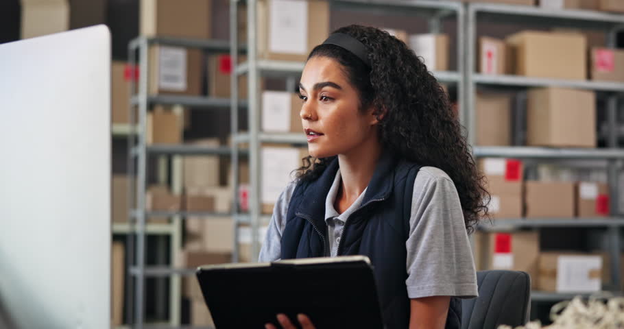 Logistics, reading and woman on computer in warehouse for distribution stock or cargo boxes. Digital technology, tablet or factory worker checking online delivery order, packages or ecommerce parcel