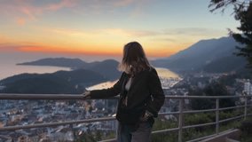 Travel.solo traveler sits peacefully atop a mountain, embracing mindfulness amidst breathtaking natural beauty. eco-travel, self-care, and the rejuvenating power of nature	 - Powered by Shutterstock - Get 15% off with code: PIKWIZARD15