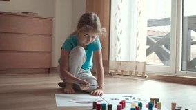 Portrait of Talented Artist Child Working on Abstract Painting Uses Paintbrush. Little Girl Painting Picture at Home. Children Creativity Inspiration Imagination. Cute Girl Kid Enjoys Painting Process - Powered by Shutterstock - Get 15% off with code: PIKWIZARD15