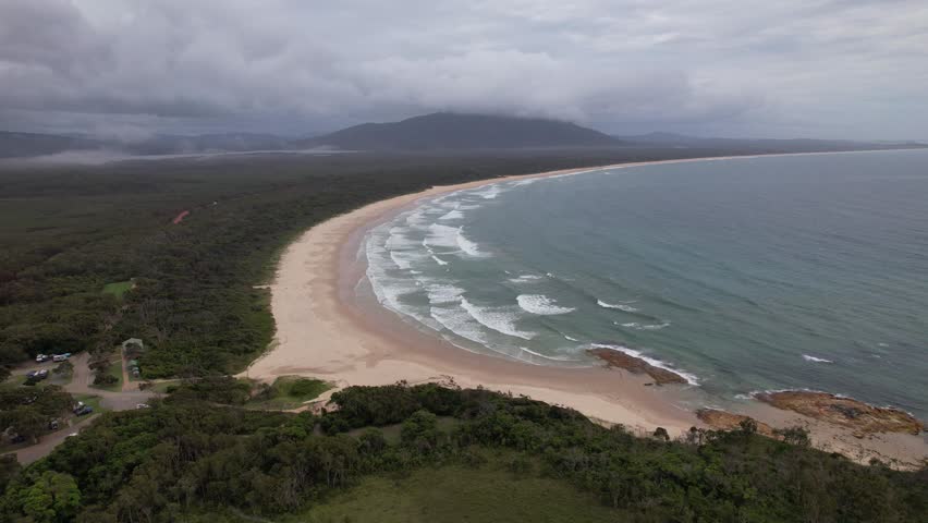 Cloudy Sky Over Diamond Head Beach And Campground In Barrington Coast, New South Wales, Australia. aerial shot