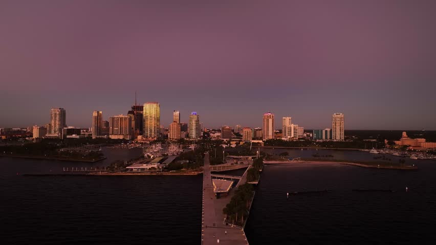 Aerial view of downtown st. petersburg at sunrise with vibrant skyline and tranquil waterfront, Downtown St. Petersburg, Florida, United States.