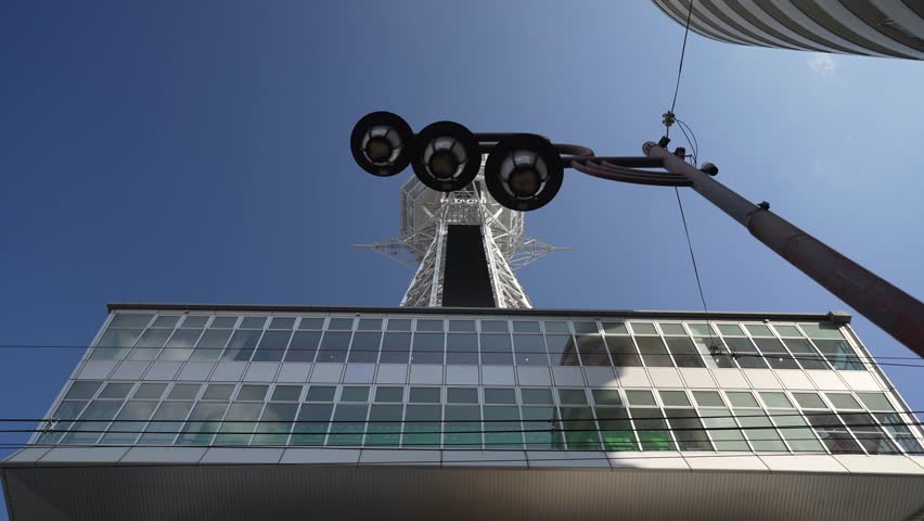 View of Tsutenkaku Tower from below on a sunny day, Shinsekai, Osaka, Honshu, Japan