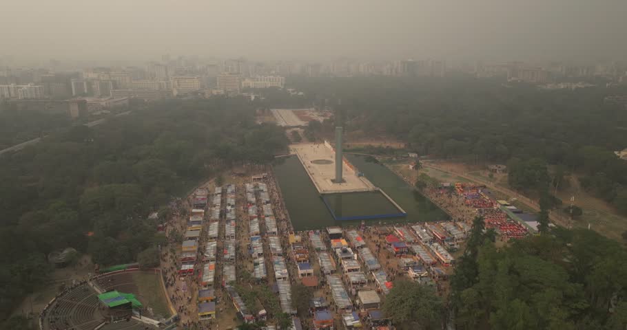 Aerial view of downtown Dhaka with the Independency Memorial surrounded by vibrant buildings and greenery, Dhaka, Dhaka Province, Bangladesh.