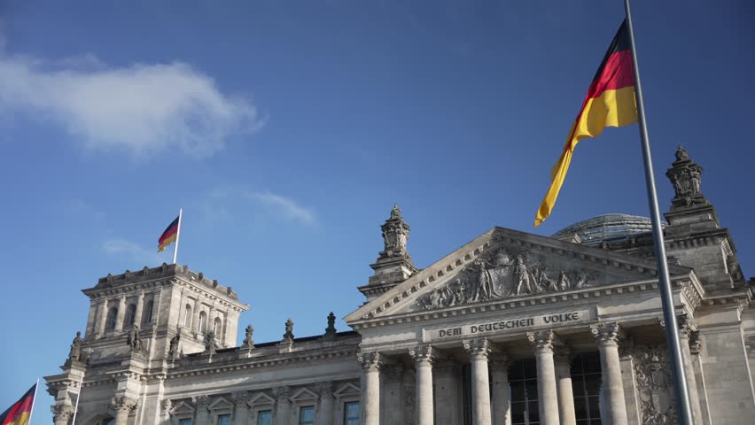 The Reichstag (German Parliament building) and blue sky, Mitte, Berlin, Germany
