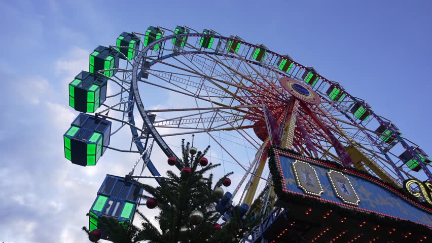 Ferris wheel on Christmas market on Rathausstrasse in winter, Mitte, Berlin, Germany