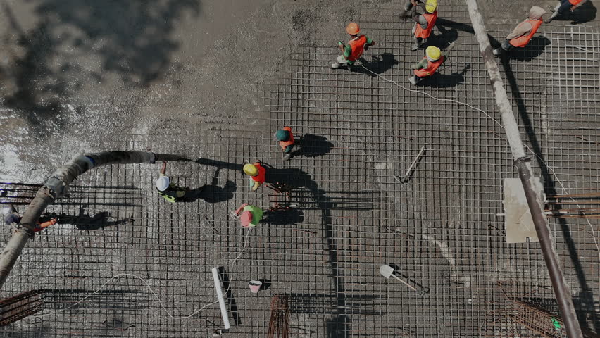 Pouring concrete with a pump drone view