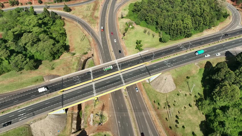 Aerial view of Ngong Road Southern Bypass Interchange with traffic and greenery, Nairobi, Nairobi, Kenya.