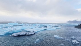 Icebergs float serenely in jokulsarlon glacier lagoon, iceland, creating a breathtaking arctic landscape - Powered by Shutterstock - Get 15% off with code: PIKWIZARD15