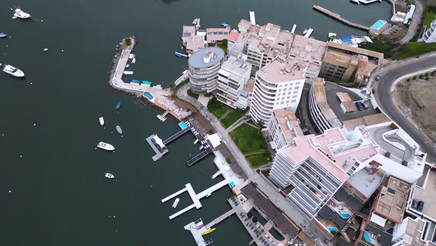 Private beach port with sleek modern buildings in Ancon, Lima, Peru.