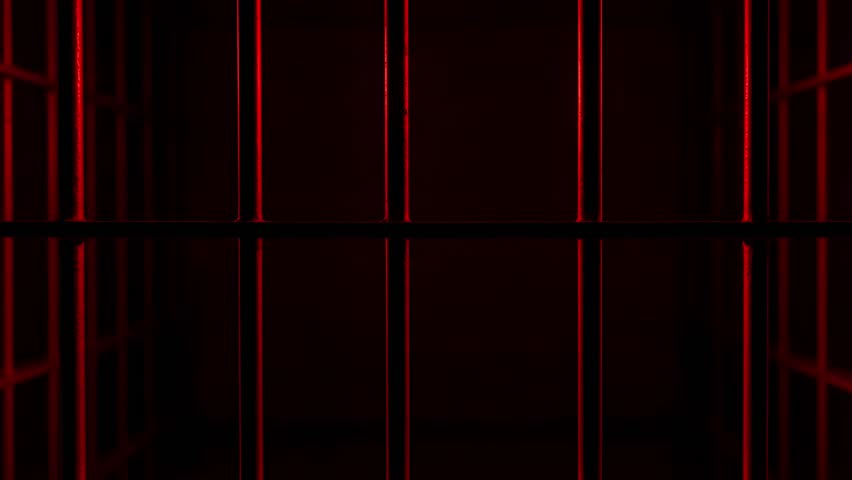 Prison Cell Bars Casting Shadows: Symbolizing Confinement and Loss of Freedom. metal prison cell bars casting shadows on the floor, representing themes of incarceration, confinement