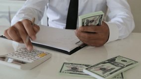 Tax concept. Tax form to fill out personal income tax return to pay taxes. Financial research. data analysis, documents, reports, tax returns, calculations. 4k 3d animation - Powered by Shutterstock - Get 15% off with code: PIKWIZARD15