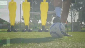 Soccer player controlling ball on field with digital data animation overlay. Football, athlete, sports technology, digital enhancement, performance, motion tracking - Powered by Shutterstock - Get 15% off with code: PIKWIZARD15