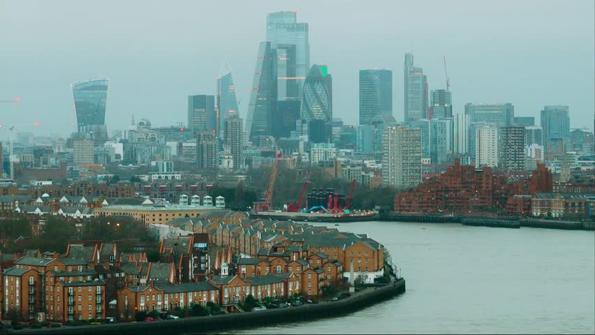 Movement of a speed boat on the river in the city at twilight, time lapse