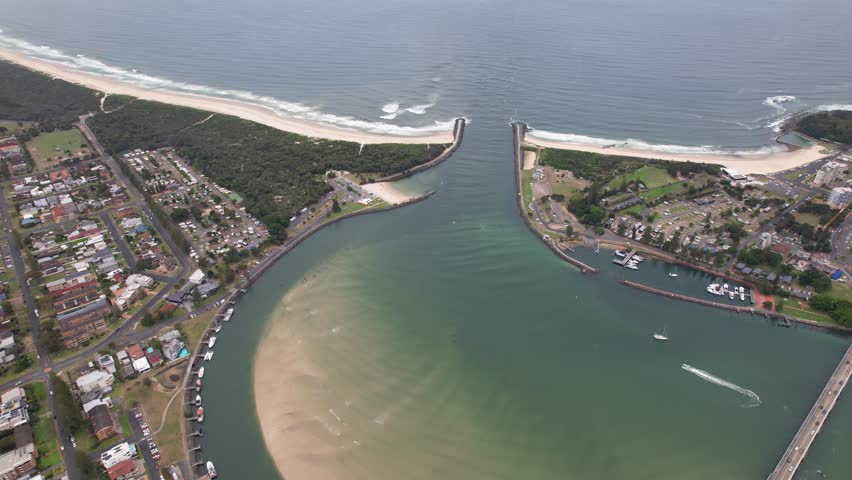 Coolongolook River Mouth Between Forster And Tuncurry In New South Wales, Australia. aerial sideways shot