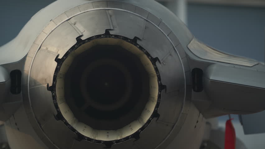Jet engine at the rear of a fighter plane.
