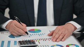 Businessman Analyzing Financial Charts and Stock Market Data - Powered by Shutterstock - Get 15% off with code: PIKWIZARD15