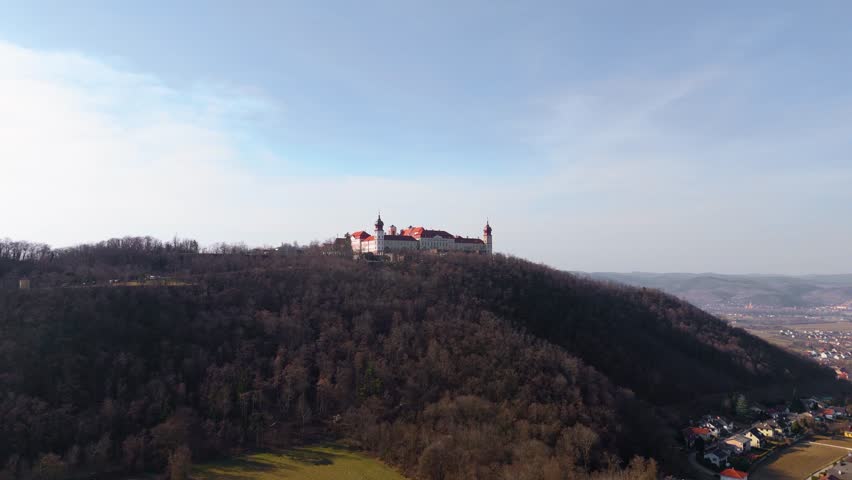 Göttweig Krems Abbey in Austria. Top cinematic aerial view. Landmarks of Austria. Drone footage. A majestic aerial shot of a monastery in Austria surrounded by trees. Göttweig Abbey