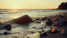 Beautiful seascape from shore in sunset or sunrise, waves washing coastline. Calmness and meditation on coast of ocean in summer vacation, contemplation beauty of nature, slow motion, enjoy solitude - Powered by Shutterstock - Get 15% off with code: PIKWIZARD15