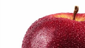 Close-up of a Juicy Red Apple with Water Droplets on a White Background. - Powered by Shutterstock - Get 15% off with code: PIKWIZARD15