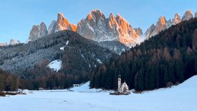 Winter landscape Dolomites Alps Santa Maddalena village Val di Funes valley South Tyrol Italy. High quality 4k footage - Powered by Shutterstock - Get 15% off with code: PIKWIZARD15