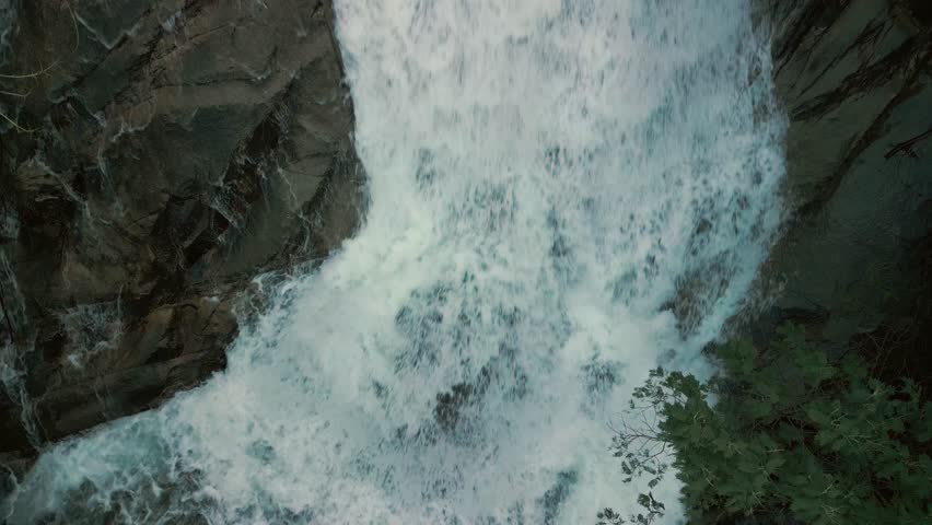 Gushing Waterfalls Of Cascada de San Xusto In Lousame, A Coruña, Spain. Aerial Tilt-up Shot