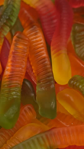 Zoom frame Colorful gummy candy jelly worms, close up