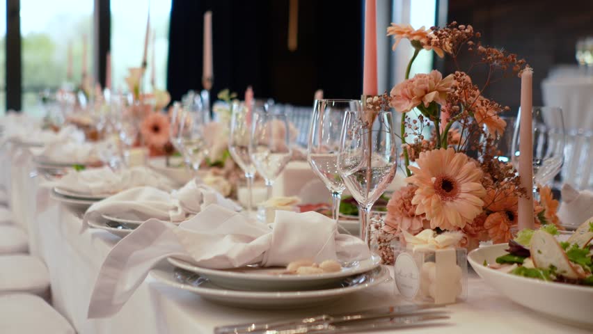 Catering service on banquet table with canape snacks in restaurant. Decorated food set on birthday, wedding celebration or business event venue. Many delicious dishes on the festive table, close-up