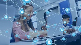 In school, students using laptops with animation of digital network connections. Technology, education, learning, innovation, classroom, connectivity - Powered by Shutterstock - Get 15% off with code: PIKWIZARD15