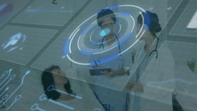 Discussing patient care, medical professionals using digital animation interface in hospital. Healthcare, technology, innovation, consultation, teamwork, collaboration - Powered by Shutterstock - Get 15% off with code: PIKWIZARD15