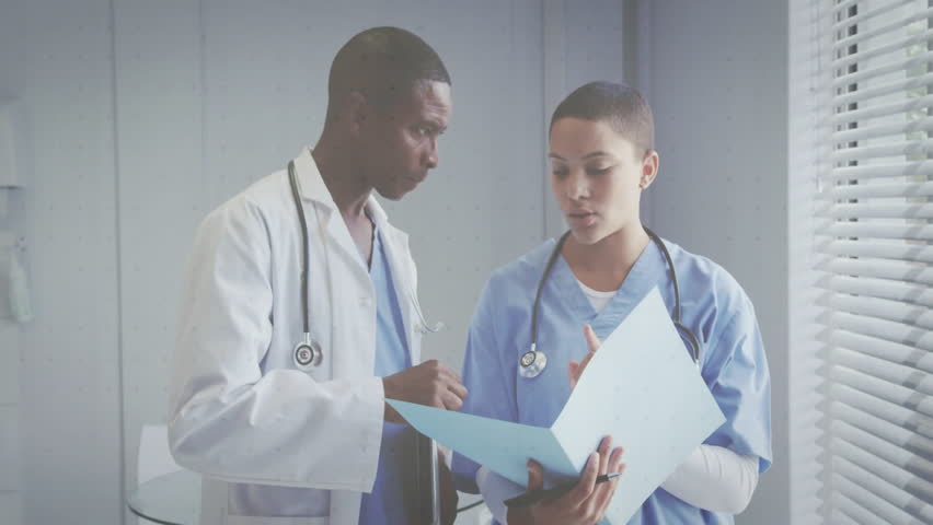 Discussing patient data, doctors with financial graphs overlaying scene in animation. Healthcare, medical, teamwork, innovation, analysis, strategy - Powered by Shutterstock - Get 15% off with code: PIKWIZARD15