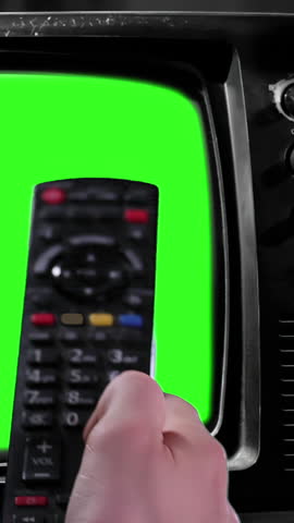 Remote Control Turning On Old TV with Green Screen - Close-Up Zoom-In - Vertical 4K