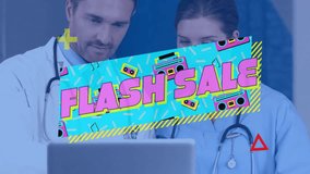 Doctors working on laptop with vibrant Flash Sale animation overlay. Healthcare, professional, teamwork, technology, digital, innovation - Powered by Shutterstock - Get 15% off with code: PIKWIZARD15