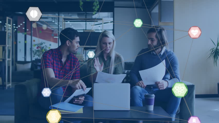 Discussing work, diverse colleagues with animation of digital network icons in office. Collaboration, teamwork, diversity, technology, innovation, communication - Powered by Shutterstock - Get 15% off with code: PIKWIZARD15