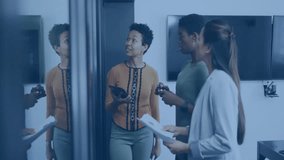 Collaborating on digital animation, diverse team analyzing data in modern office. Teamwork, brainstorming, innovation, technology, diversity, analytics - Powered by Shutterstock - Get 15% off with code: PIKWIZARD15