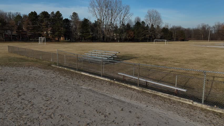 Empty Bleachers At Baseball Field