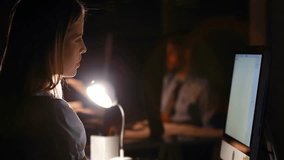 Interacting with animation, woman using digital network interface in dimly lit room. Technology, innovation, virtual, connectivity, interaction, futuristic - Powered by Shutterstock - Get 15% off with code: PIKWIZARD15