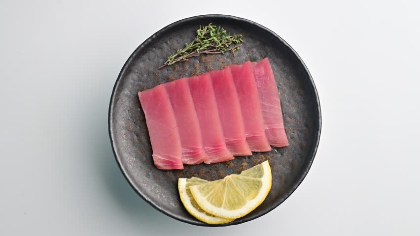 Premium quality tuna sashimi, ideal for a refreshing appetizer or light meal that delights the senses. 