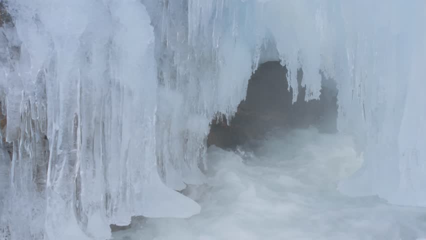 Ice-Clad Mongefossen Waterfall Flowing into Rauma River, NORWAY