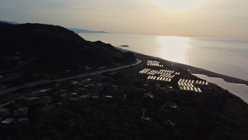 Small village with morning in state of Jijel, Algeria, rural village, A beautiful Mediterranean village in North Africa, Algeria from above, A small town overlooking the Mediterranean sea.