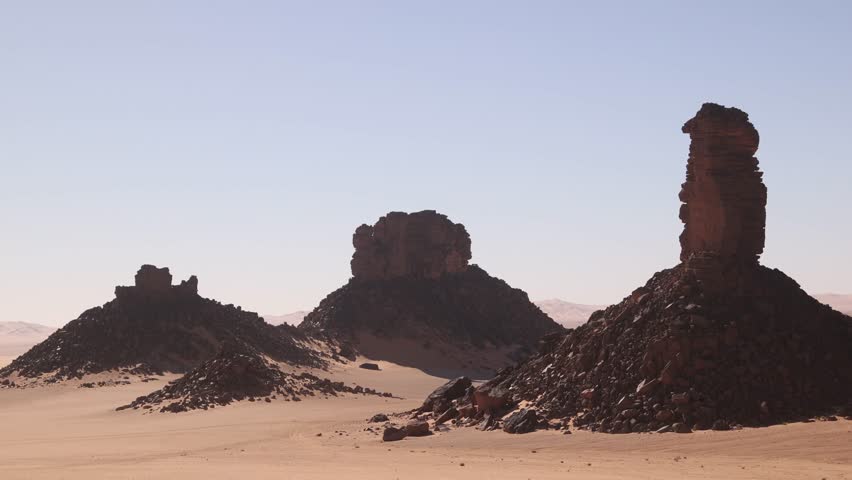 panoramic view scenic desert landscape under clear sky in Tassilli N